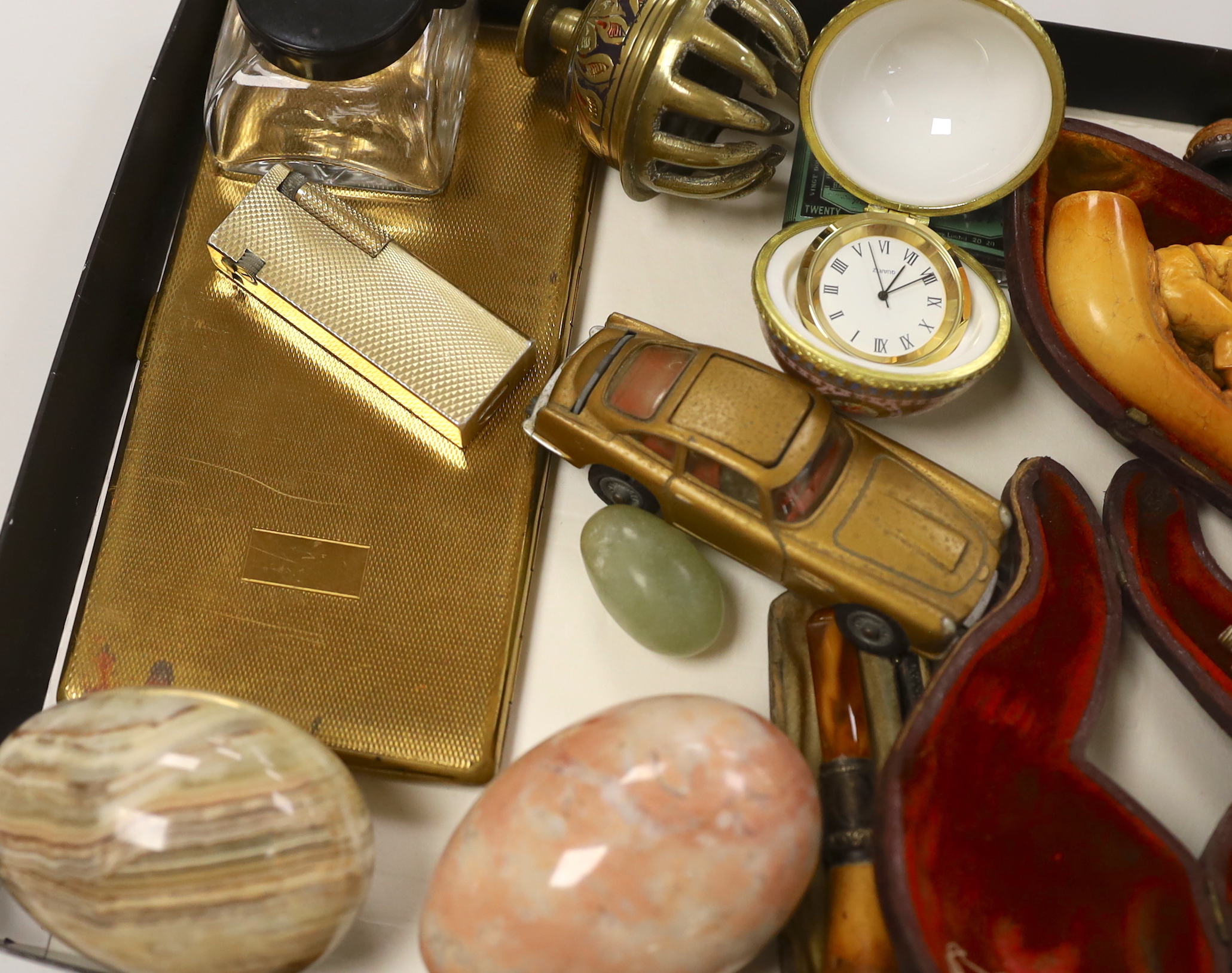 A group of mixed collectables including a Corgi James Bond Aston Martin DB, smoking pipes etc.